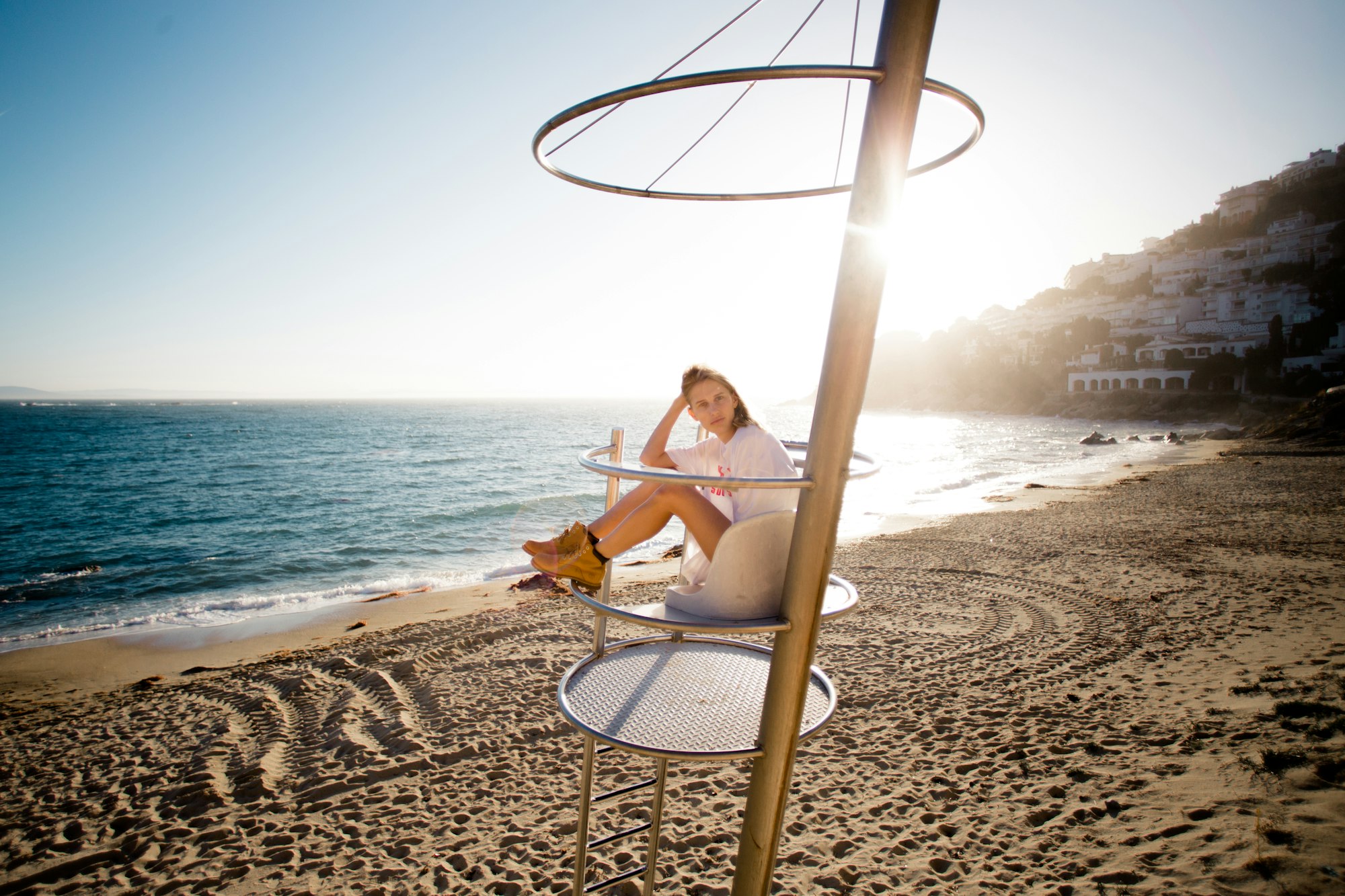 Beautiful model on beach in sunset